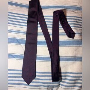 Maroon and blue tie with geometric pattern